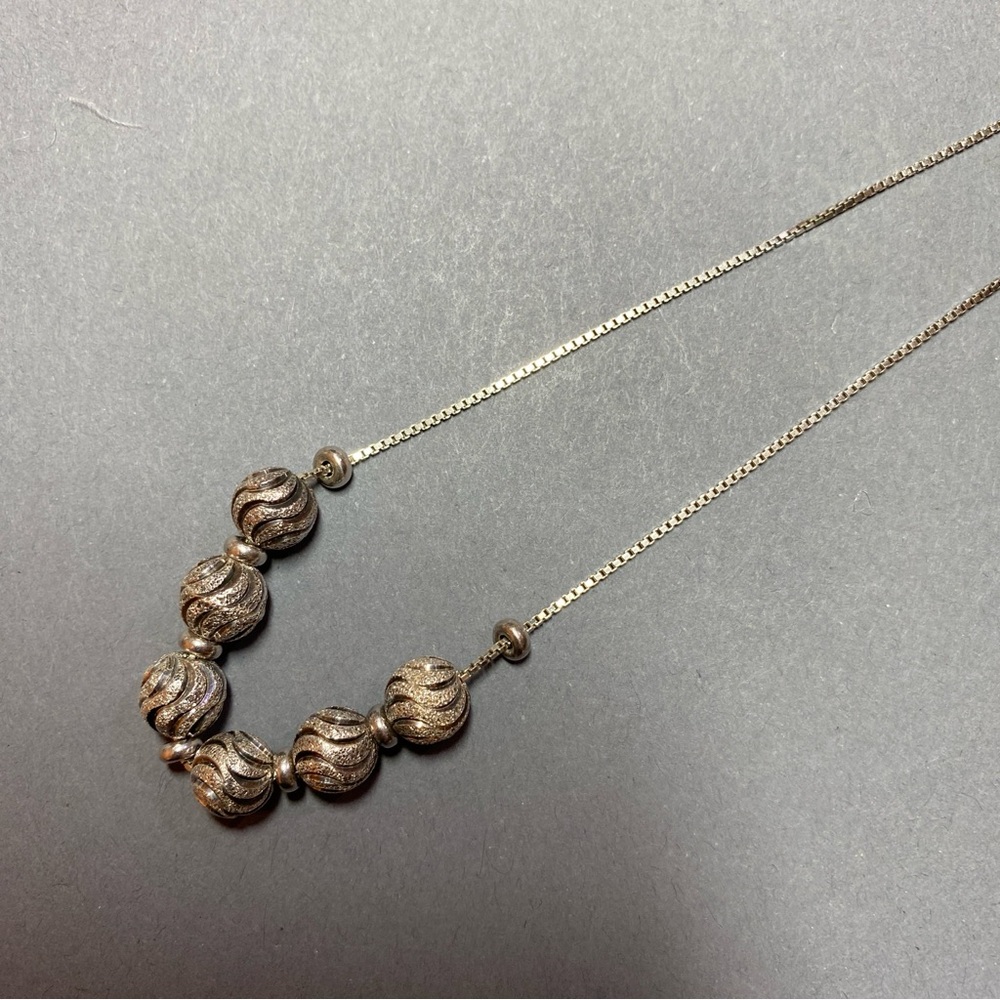 Vintage sterling silver laser cut round bead necklace